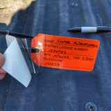 Self laminating tags to secure information to harvested game animals while hunting in Arizona
